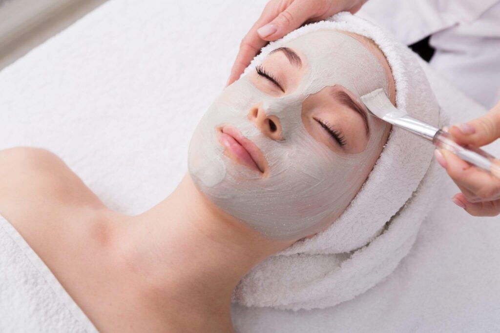 a woman getting face massage