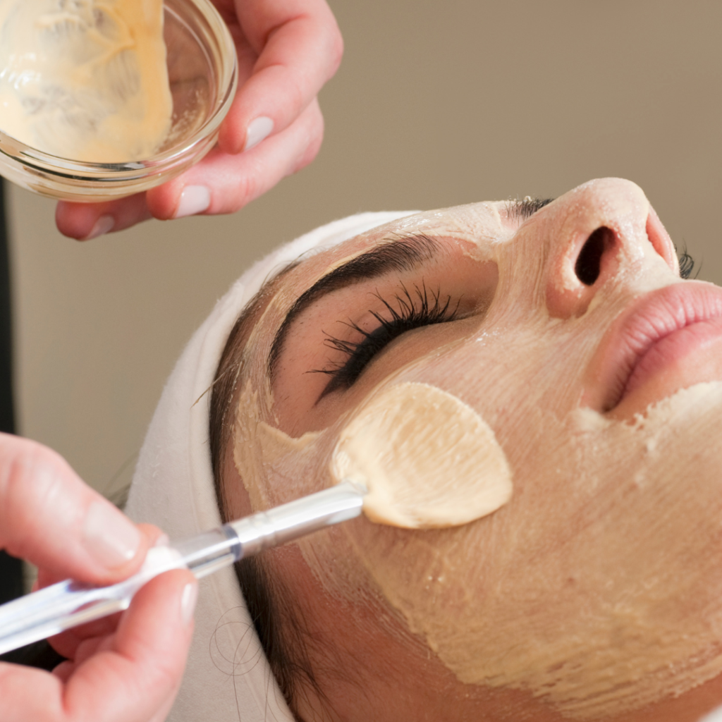 a woman getting facial treatment